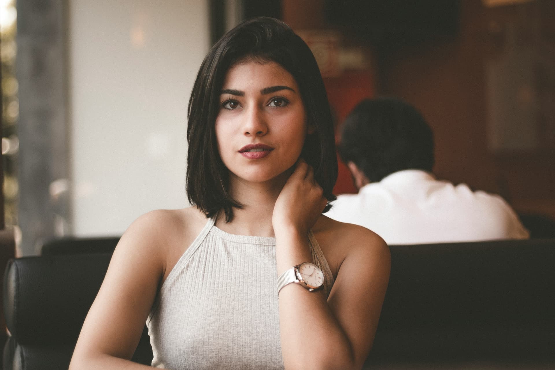 A woman in quiet reflection, representing the internal experience of adult ADHD in women.